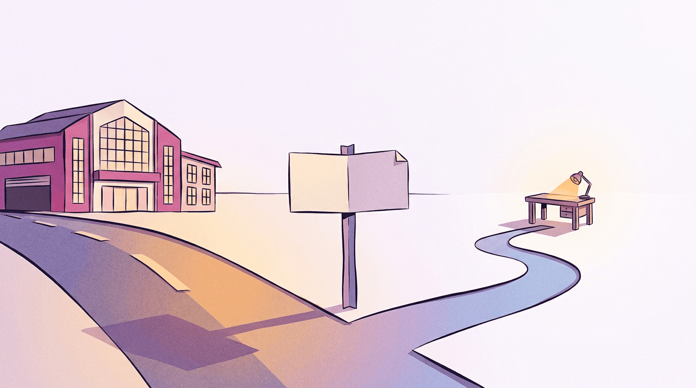 Blank paper signpost at a fork where one road leads to a large studio building and the other to a single small workbench